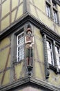 Wooden statue at a house in Colmar, Elzas, France