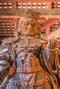 Wooden statue of Komokuten guardian (Deva king) One of Celestial Guardians of Four Directions at Daibutsu-den (Great Buddha Hall) Royalty Free Stock Photo