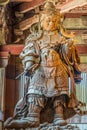 Wooden statue of Komokuten guardian (Deva king) One of Celestial Guardians of Four Directions at Daibutsu-den (Great Buddha Hall) Royalty Free Stock Photo