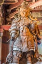 Wooden statue of Komokuten guardian (Deva king) One of Celestial Guardians of Four Directions at Daibutsu-den (Great Buddha Hall) Royalty Free Stock Photo