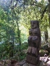 Wooden statue, in the middle of the Huilo Huilo Biological Reserve, regressing animals and Mapuche mystical characters from Royalty Free Stock Photo