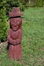 Wooden statue in the shape of a woman in the park