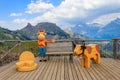 Wooden statues of cows with bench on observation deck at Schynige Platte, Switzerland Royalty Free Stock Photo