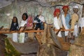 Wooden statues of Tau Tau and coffins in TampangAllo burial cave at Tana Toraja. Indonesia