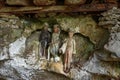 Wooden statues of Tau Tau in TampangAllo burial cave at Tana Toraja. Indonesia