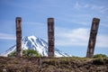 Wooden statues on the Vilyuchinsky pass in June, Kamchatka Peninsula, Russia