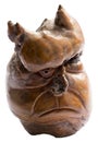 Wooden statuette with face of demon Royalty Free Stock Photo
