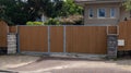 Wooden steel gate fencing facade modern new home style wood street view outdoor