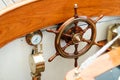 Wooden steering wheel on a sea yacht Royalty Free Stock Photo