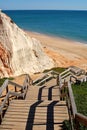 Red/white rock formations on the Falesia beach in Albufeira - Portugal Royalty Free Stock Photo