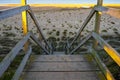 Wooden steps heading down over the beach and sand dunes at Lowestoft Suffolk Royalty Free Stock Photo