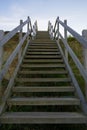 Wooden steps heading down over the beach and sand dunes at Lowestoft Suffolk Royalty Free Stock Photo