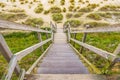 Wooden steps heading down over the beach and sand dunes at Lowestoft Suffolk Royalty Free Stock Photo