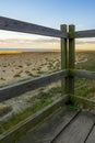 Wooden steps heading down over the beach and sand dunes at Lowestoft Suffolk Royalty Free Stock Photo