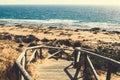 Wooden steps over dunes to the beach on Cape Trafalgar, Spain Royalty Free Stock Photo