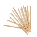 Wooden stirrers for coffee, tea and drinks, laid out in random order, isolated on a white background. Royalty Free Stock Photo