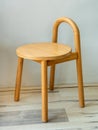 Wooden stool in natural color and simple design