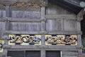 Storehouse facade with famous Monkeys carving from Toshogu Shrine Temple in Nikko National Park of Japan Royalty Free Stock Photo