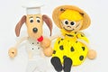 Wooden and string puppets: dog chef and bee Royalty Free Stock Photo