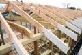 The wooden structure of the building. Roofing Construction. Wooden Roof Frame House Construction Royalty Free Stock Photo