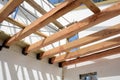 The wooden structure of the building. Wooden roof frame building. TFB system comprises thermo blocks filled with concrete.