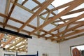 The wooden structure of the building. Wooden roof frame building. TFB system comprises thermo blocks filled with concrete.