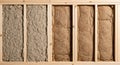 Energy-efficient home construction featuring a wooden stud wall filled with both natural fiber insulation and traditional mineral Royalty Free Stock Photo