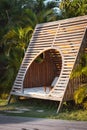 Wooden summer day bed couch for relaxing in a luxury resort Royalty Free Stock Photo