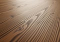 Wooden surface with distinct grain patterns and knots, resembling polished floorboards. The texture Royalty Free Stock Photo