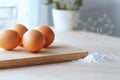 A wooden surface holds fresh eggs, while molecular symbols of protein content float nearby, Generated AI Royalty Free Stock Photo