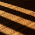 Wooden surface with light and shadow pattern. Sunlight casts diagonal shadows of Royalty Free Stock Photo