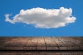 Wooden surface. Painted boards. Old table. Table surface. Wooden table against the background of a cloud on a blue sky Royalty Free Stock Photo