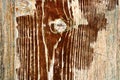 Wooden surface with shriveled paint layer