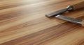 Wooden surface with two chisels, featuring polished metal blades and wooden handles Royalty Free Stock Photo