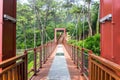 The wooden suspension bridge on the rock cilff in Haeundae Dongbaekseom Island near Haehundae beach Royalty Free Stock Photo