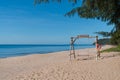 Wooden swing on sand beach at Ban Krut beach in Prachuap khiri khan, Thailand. summer relax vacation. calm wave sea Royalty Free Stock Photo