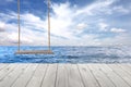 wooden swing and wood floor on sea wave in blue sky background. Royalty Free Stock Photo