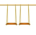 Wooden swings hanging on ropes