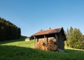 Wooden Swiss shed and wood piles, Switzerland