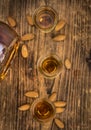 Wooden table with Amaretto Shots detailed close-up shot; selective focus Royalty Free Stock Photo