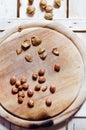 Wooden table with apricot pits Royalty Free Stock Photo