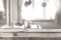 Wooden table and blur kitchen room for background, black and white tone.