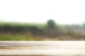 Wooden table blurred background of landscape with nature green and mountain Royalty Free Stock Photo