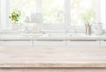 Wooden table on blurred backgrounds of kitchen white sink window Royalty Free Stock Photo