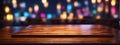 Wooden table, blurred bokeh background background. Neon light, night view, close-up. The general background of the interior, a dar Royalty Free Stock Photo
