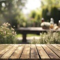 Wooden table with blurred garden background Royalty Free Stock Photo