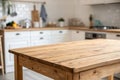 Wooden table with blurred kitchen background Royalty Free Stock Photo