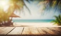 a wooden table with a blurry beach in the background