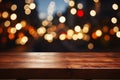 Wooden table with bokeh lights, ideal for festive New Years displays