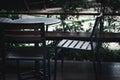 Wooden table and chair set in a coffee shop Royalty Free Stock Photo